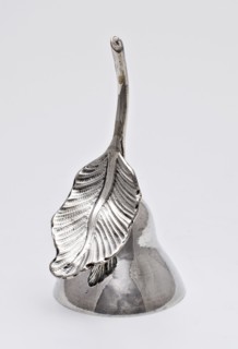 Call with stem in the shape of leaf, handbell sound silver, molded bell-shaped smooth bell with clapper handle formed by stem