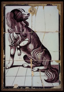 Tile panel, six tiles, purple on white, sitting dog with lifted left front leg, tile picture ceramic earthenware glaze, baked 2x