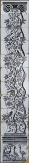 Purple tile pilaster, twisted column along which vine with apples and birds, tile pilaster sculpture ceramic earthenware glaze