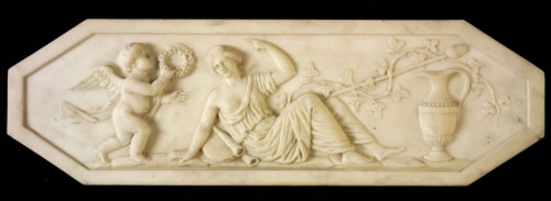 White octagonal relief, allegory to music, classical lady with left flutes and tambour, left putto or angel with wreath, relief