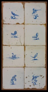 Tile field, eight tiles, blue on white, birds, including two cocks on the ground, tiled field wall tile sculpture ceramics