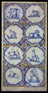 Tile field, eight tiles, braces with elephant, blue on white, corner motif wing leaf, tiled field wall tile sculpture
