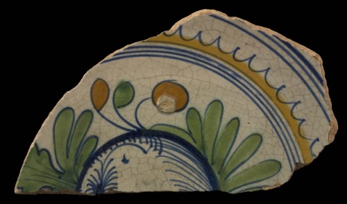 Fragment majolica dish decorated with fruit, in polychrome version on white ground, dish plate crockery holder earth discovery
