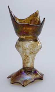 Fragment of part of foot and of stem of goblet, drinking glass drinking utensils tableware holder soil find glass, hand-blown