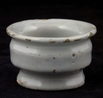 Pottery ointment jar, low model, on base, wide top edge and two constrictions, white glazed, ointment jar pot holder soil found