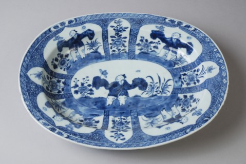 Oval porcelain dish with blue Oriental figure with flowers, saucer dish tableware holder ceramic porcelain glaze, baked painted