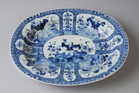 Oval porcelain dish with depiction in blue, dish saucer tableware holder ceramic porcelain glaze, baked painted glazed oval deep