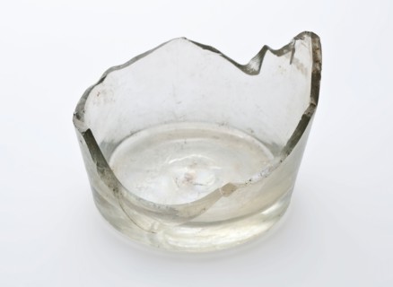 Bottom fragment of drinking glass with radgraving, clear glass, pontilmark, goblet drinking glass drinking utensils tableware
