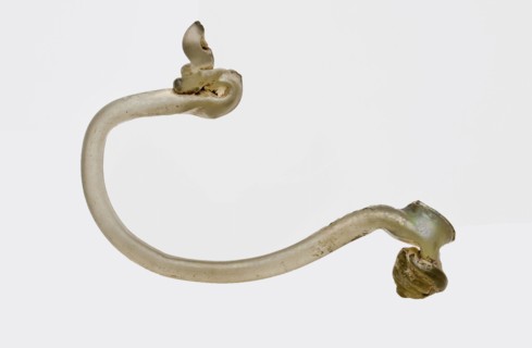 Ear of light green glass, curled with acorn shape on the base, vase? drinking glass? drinking utensils? tableware holder soil