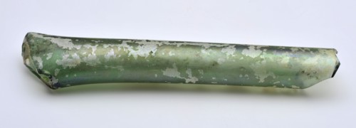 Glass tube or neck, cylindrical and pinched on one side, glass soil found glass, w 1.9 hand-blown Glass tube Possible neck
