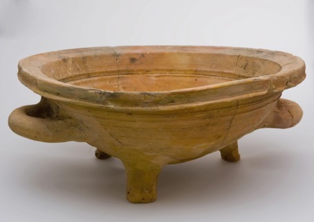 Pottery bowl on three legs, two low-lying, lying sausage ears, unglazed, staining fire test soil foundry ceramics pottery, hand