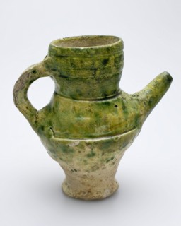Pottery feeding bottle or small jug with spout, yellow shard mottled green glazed, Bottle soil find ceramic earthenware glaze
