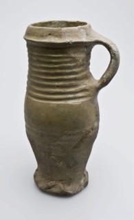 Stoneware pot on pinched foot, proto stoneware with ear and slanted top edge, drinking jug soil found ceramic stoneware, edge