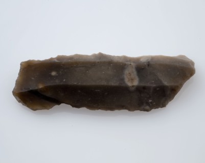 Flint blade of gray flint, klij soil found flint, chopped Blade of gray flint from the stone age or bronze age Dirt white spots