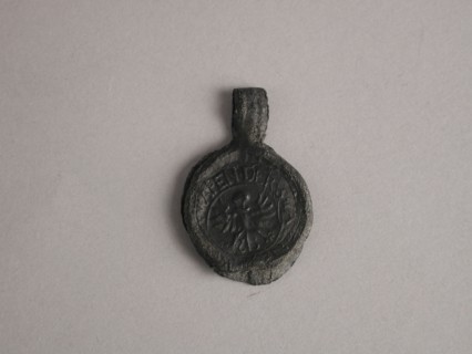 Sheet of cloth with text from Neuruppin, subprocessor lead pinned-red cloth seal hallmark ground find lead metal, Cloth bobbin