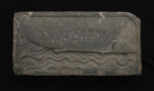 Facade stone with sturgeon on waves, facing brick sculpture sculpture building component sandstone stone, sculpted Rectangular