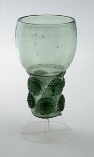 Fragment of part of the foot and of the soil, trunk and calyx of the roemer, roemer wineglass drinking glass drinking utensils