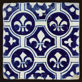 Ornament tile with French lily decor in blue, wall tile tile sculpture ceramic earthenware glaze, baked 2x glazed painted Yellow