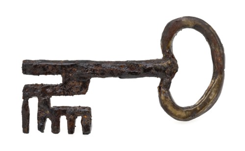 Iron key, kidney-shaped handle, beard with six teeth, key iron commodity founding iron metal, forged sawn iron key. Kidney
