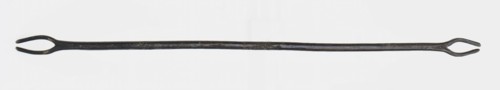 Long brass pen with two open, oval eyes at the ends, fines needle?, penalty needle? Soil discovery copper brass metal, w 1.1