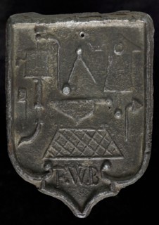 FWB, Roof lead, shield-shaped cover plate with initials FWB and guide tool, lead hallmark lead metal, Roof bonnet shield shaped