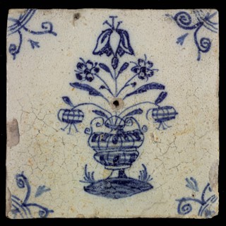 Flower tile with large flower pot, blue decor on white ground, corner filling: ox head, wall tile tile sculpture ceramic