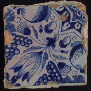 Ornament tile, star tulip with half bunch of grapes and half orange apple, corner pattern quartz and quarter rosette, wall tile