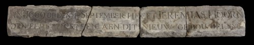 Elongated facing brick with text: 1669 ... First stone ... Jeremias Hoorn, facing bricks building limestone stone, Rectangular