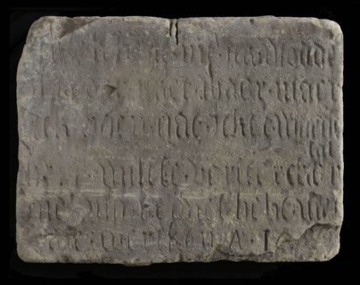 Facade stone with text in Gothic letters, facing brick building component limestone stone, minced Rectangular flat text