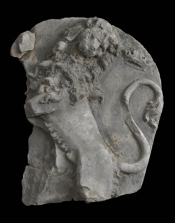 Fragment of the facing brick of brewery De Witte Leeuw, gable stone fragment sculpture sculpture building component sandstone