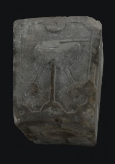 Stone of gate of vleeshal, Rotterdam, front chopping block, bottom decorated, keystone building element facing stone sculpture