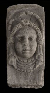 Keystone with gable head, female head with headscarf, keystone gable ornament building component sandstone stone, sculpted Above
