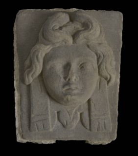 Head, woman with hair lifted up, gable wall stone ornament sculpture sculpture building component sandstone stone, sculpted