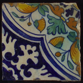 Ornament tile, diagonal ornament in quatrefoil with bows in which orange-apples and flowers, palm corner, corner pattern rosette