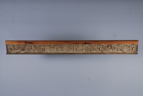 Wooden rectangular lintel with carved acanthus motifs around COLOGNE lettering, door frame wood carving sculpture sculpture wood
