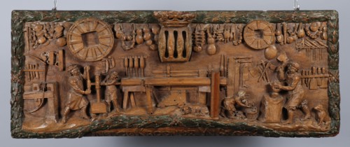 Wooden facade plate of block factory at the Leuvehaven with Int GeKroonde Ynblock, gable wood carving sculpture sculpture beech