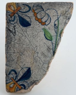 Fragment flower tile with corner decoration and central multi-colored flower arrangement, corner pattern lily, wall tile