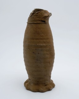 Stoneware jug placed on squeeze foot, Jug or jacobakan, Jug or jacobakan jug crockery holder soil find ceramic stoneware, hand