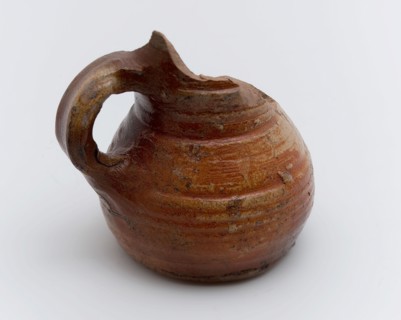 Stoneware jug be on convex surface, bulbous model with low belly, jug holder soil find ceramic stoneware glaze salt glaze, hand