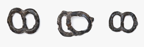 Three pewter ornamental buckles with two oval eyes, clasp fastener component soil find tin metal largest, cast Three pewter