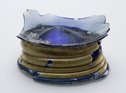 Fragment of part foot, bottom and part wall of bowl in blue glass, bowl crockery holder soil find glass, hand-blown Fragment