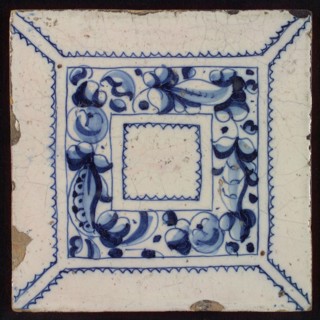 Tile, blue draft on white ground, central decor with square frame in which foglie ornament, zigzag lines, wall tile