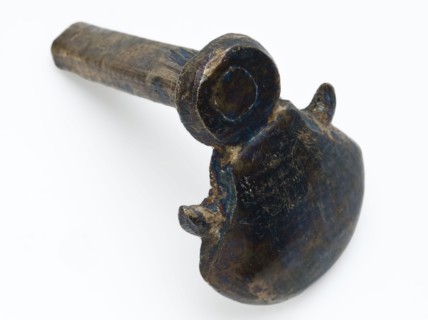 Wall hook or fitting in the form of fan and two horns, hook fitting soil find bronze copper metal, cast Flat metal scallop