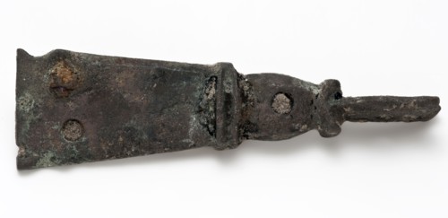 Single attachment plate, narrowly extending and ending in part with hole, herd soil found copper metal, Single horseshoe flared