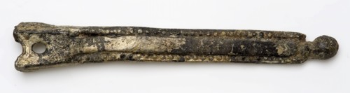 Hollow metal object, narrowed and ending in ball, decorative fittings?, decorative fittings clothing accessories clothing soil