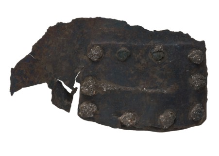 Rectangular torn fragment with batter, probably from cooking pot, batter soil find copper metal, whipped riveted Piece copper