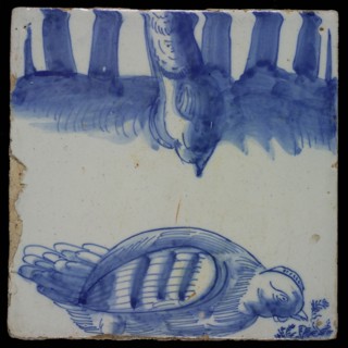 Blue tile with chicken and carrot stalks, foot of chimney pilaster of 13 tiles, tree of bunches of grapes