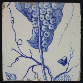Blue grape stems with stem, spiderweb, leaves and tendrils belonging to chimney pilaster with 13 tiles, tree of bunches of