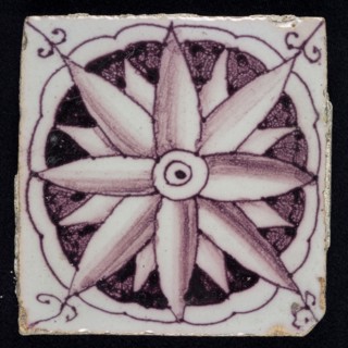 Square purple corner edge tile with central corner design, star-shaped, edge tile wall tile tile sculpture ceramic earthenware