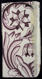 Rectangular edge tile in purple with sling decor of speckled tulip, flower with ten triangular petals